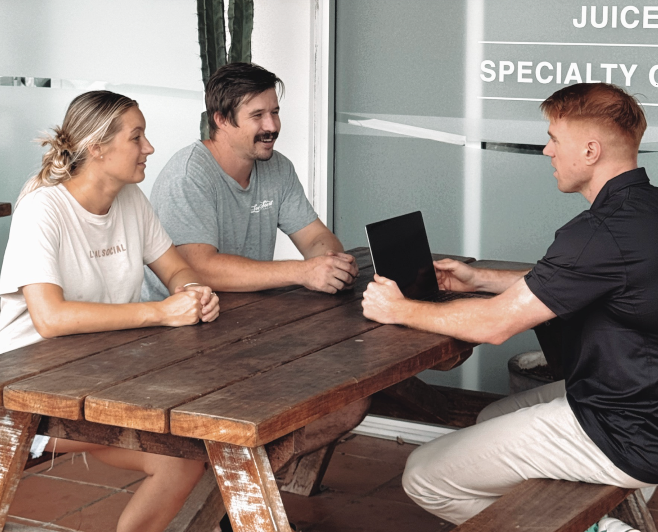 pat meeting with two cafe owners 